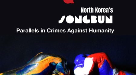 Painted fists bumping together.