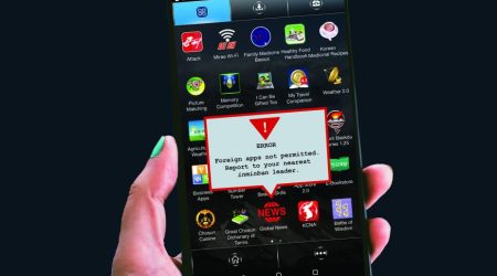 Hand holding a smartphone.